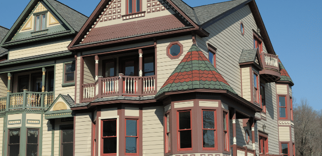 Colorful exterior image of Victorian homes reminiscent of those in Atlanta's Grant Park.