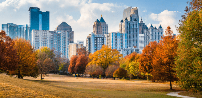 atlanta skyline over piedmont park in autumn