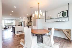 open floorplan with wood floors and natural light