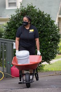 HomeAid Atlanta Volunteer helps during care day