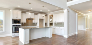 Harcrest Homes white kitchen with large kitchen island for new year