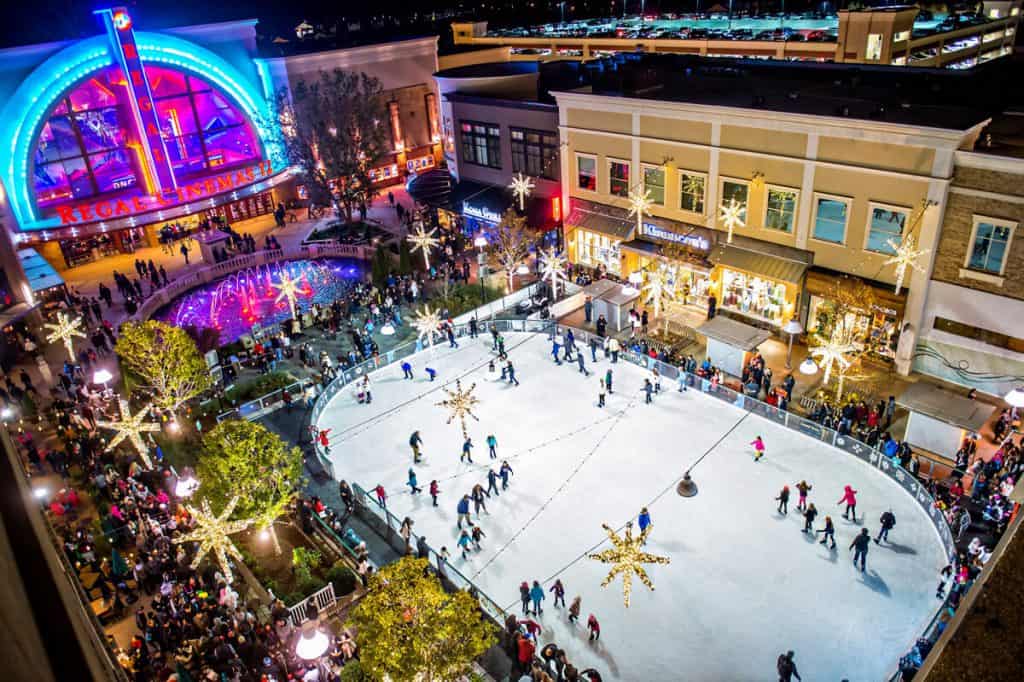 Aerial view of Avalon outdoors theater with ice skating in the winter in Johns Creek 