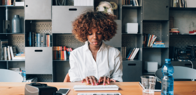 Woman at home office showing remote work