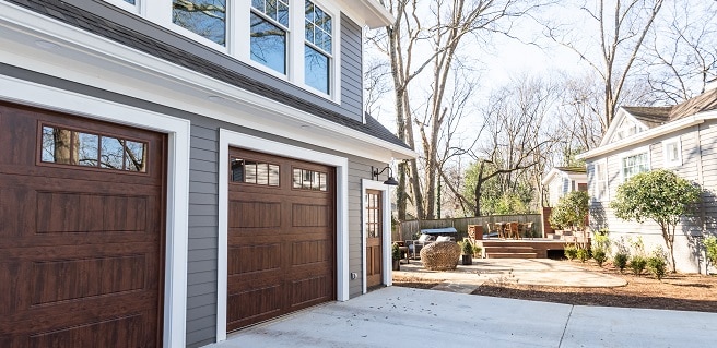 Patio, Detached Garage Addition Gives Functional Farmhouse Charm