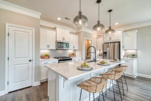 White kitchens are a hot home design trend with many options of countertops and cabinets in the latest shades of white.