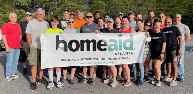 HomeAid Atlanta Group Picture Celebrating Summer Volunteer Efforts