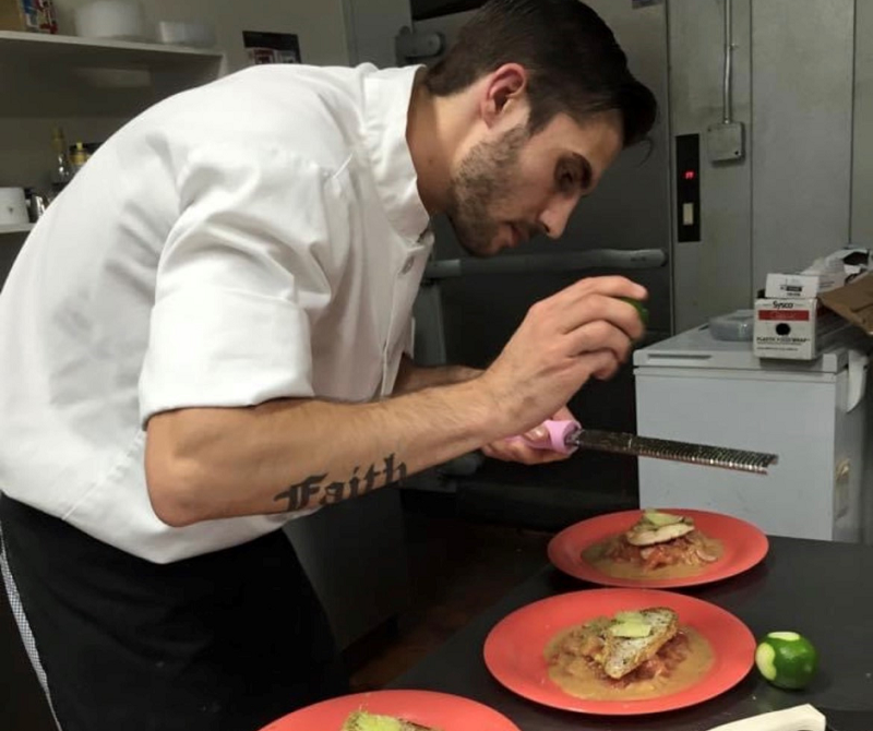 Southern Grace Chef putting final touches on delicious dishes at chamblee food hall