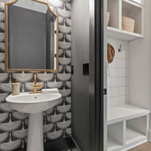 design trends bathroom with bold black wallpaper and board and batten mudroom