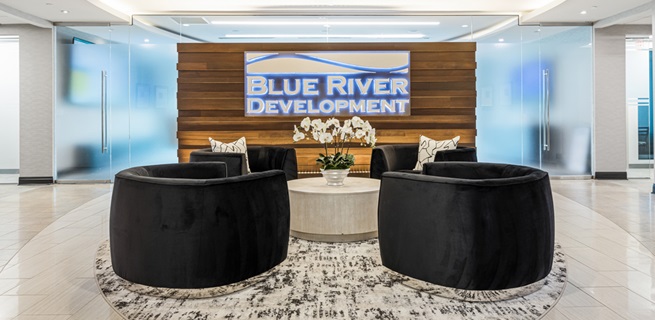Blue River Development, a leader in real estate development and investment, is proud to announce its move to a new, larger office space in Peachtree Corners, Georgia